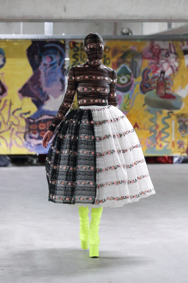 Model in a black-and-white floral runway look